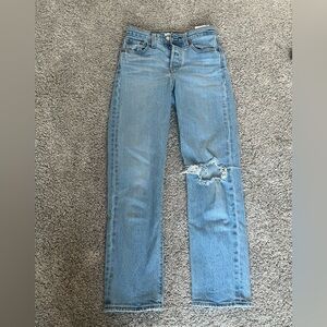 Levis tight slightly ripped denim jeans